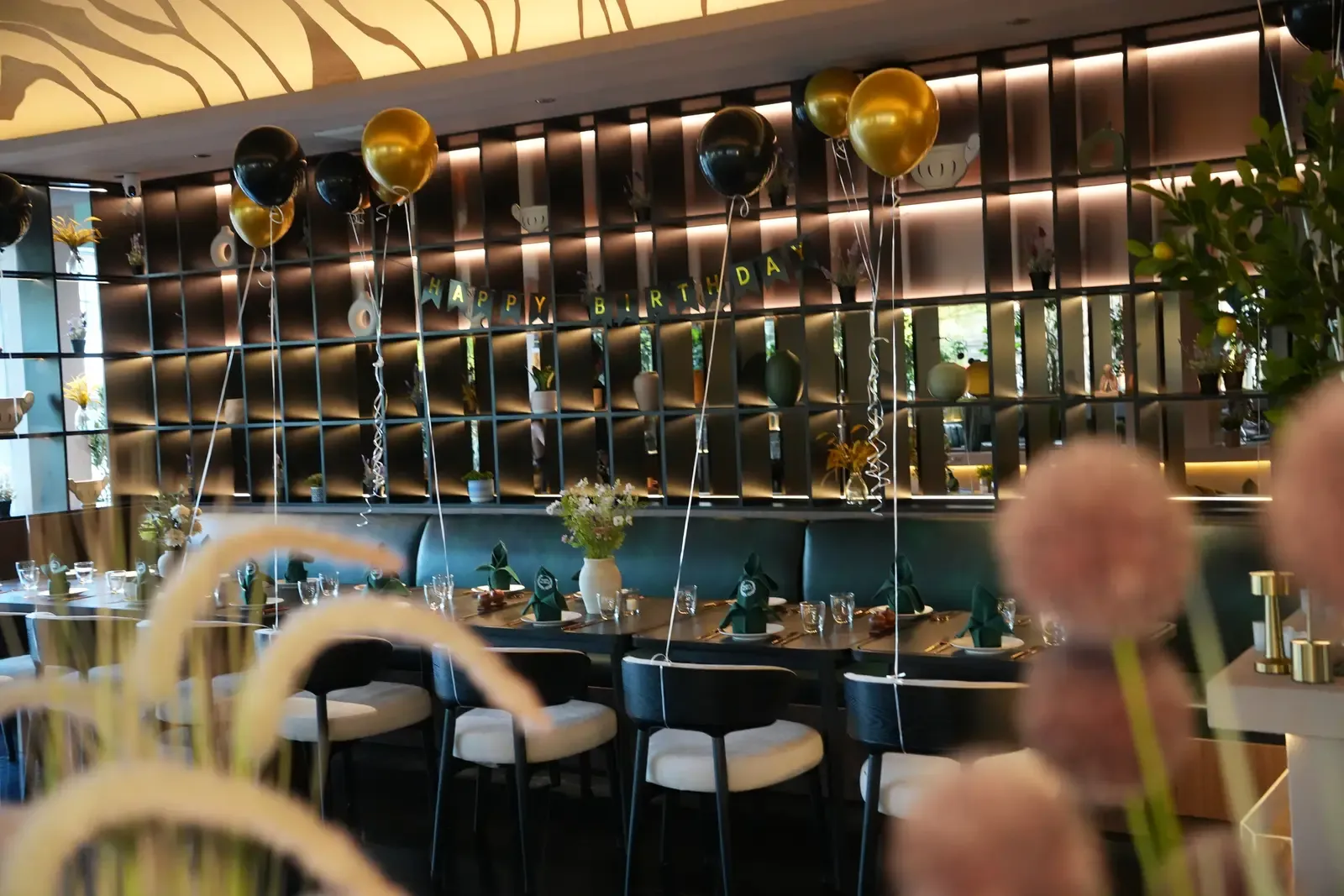 Private birthday dinner setup in the dining room at Maison Almaz, Canggu