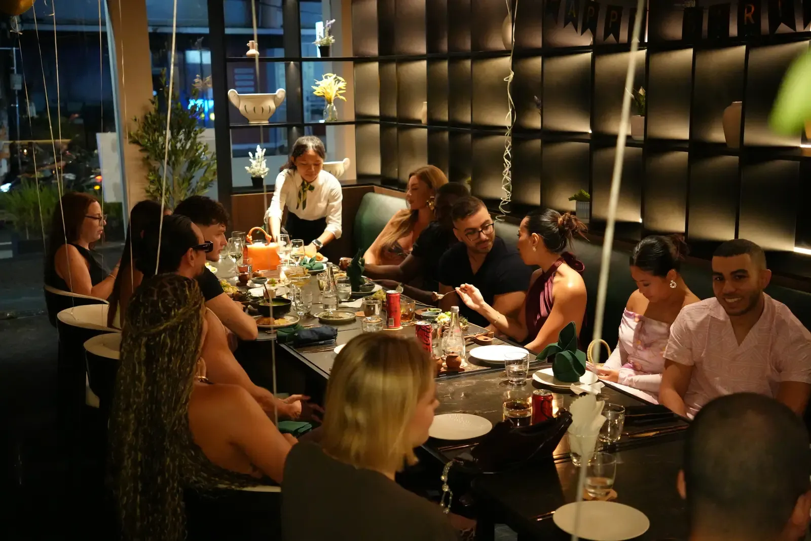 The team serving a birthday group at Maison Almaz, Canggu