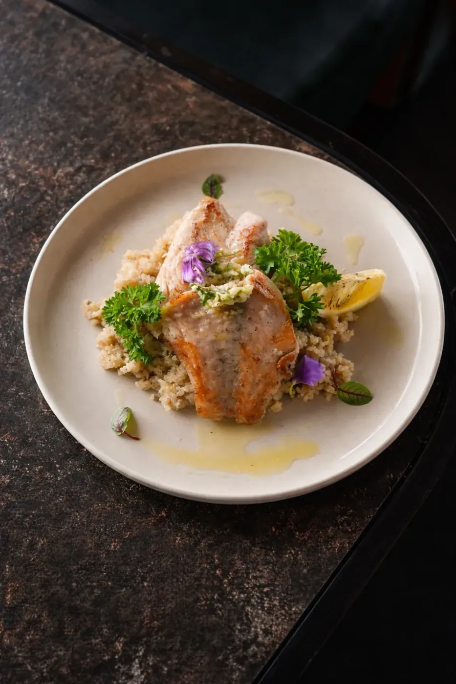 Grilled fish fillet over herbed rice
