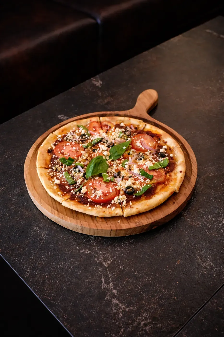 Mediterranean pizza with kalamata olives and feta
