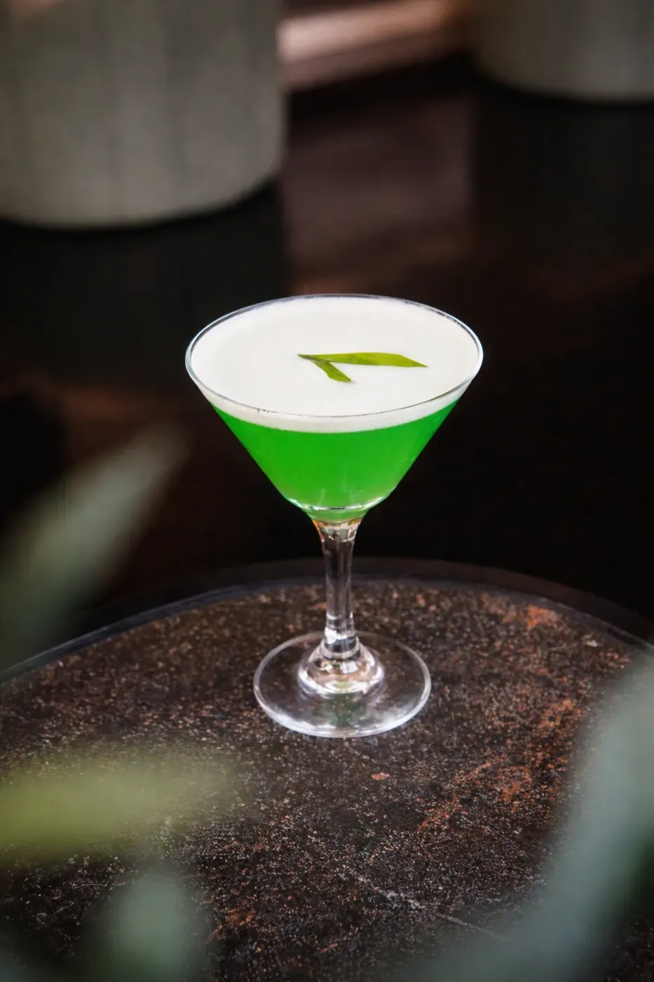 Emerald green martini cocktail
