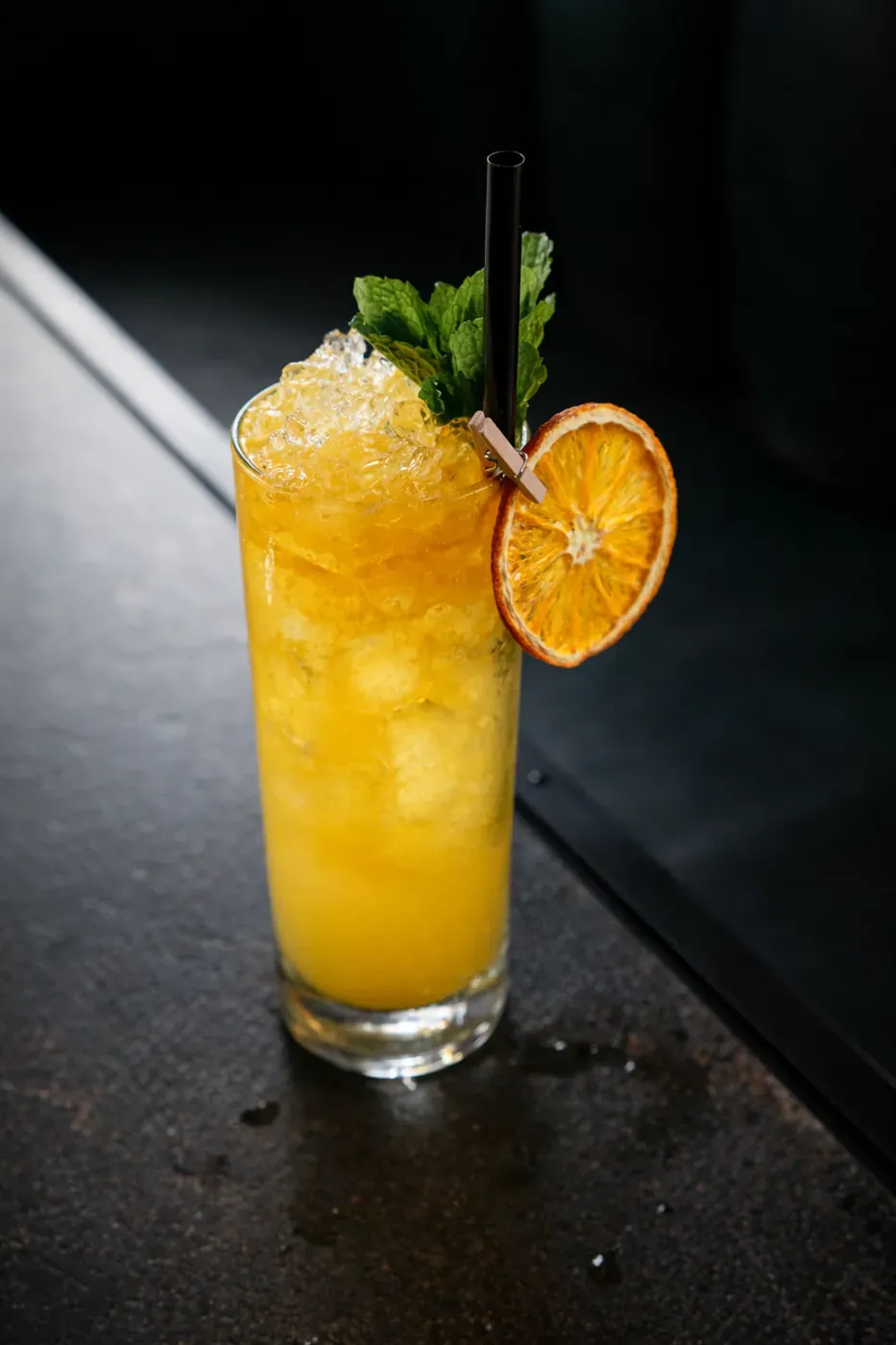 Orange citrus cocktail over crushed ice