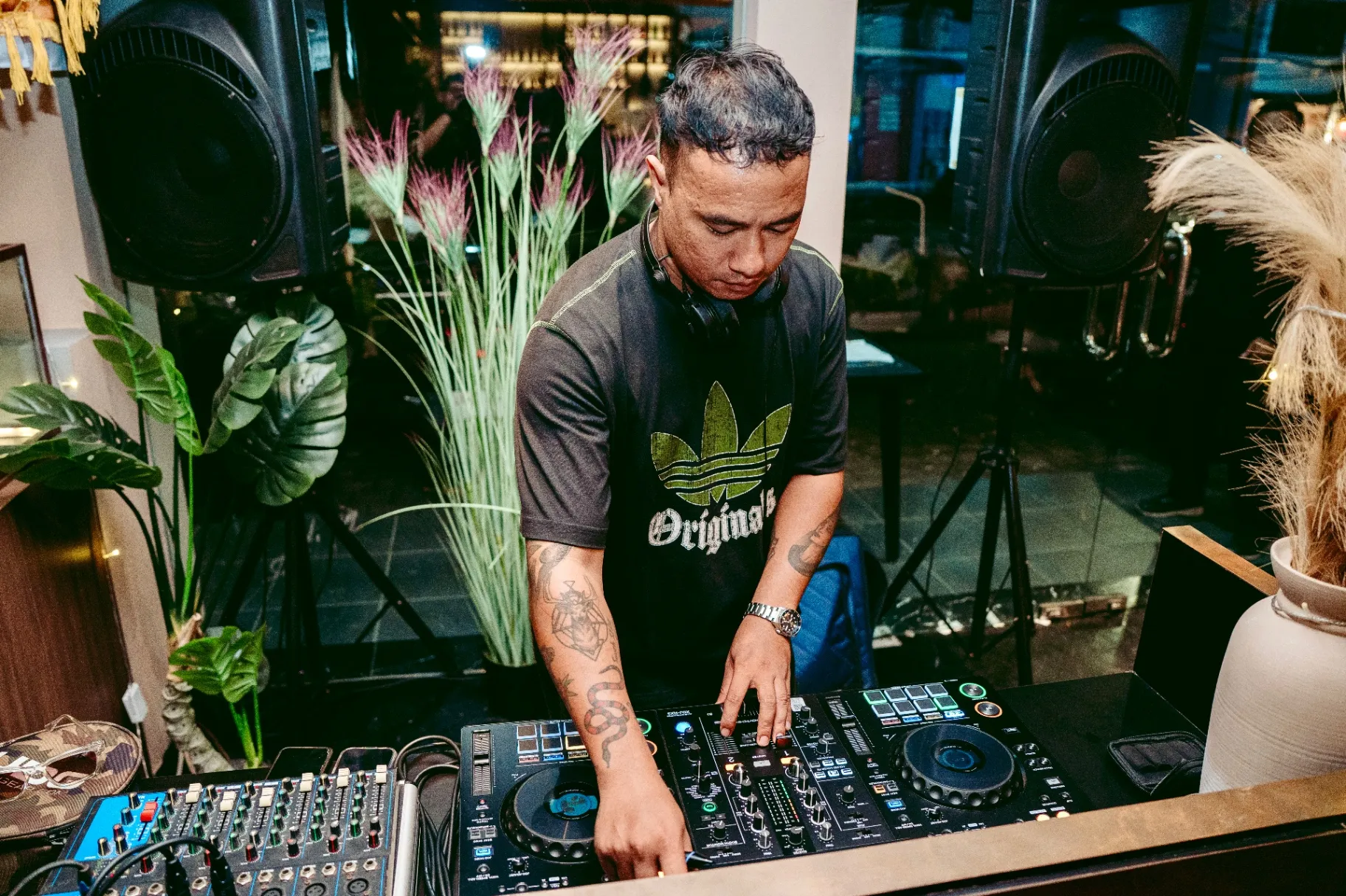 DJ entertaining the crowd with speakers