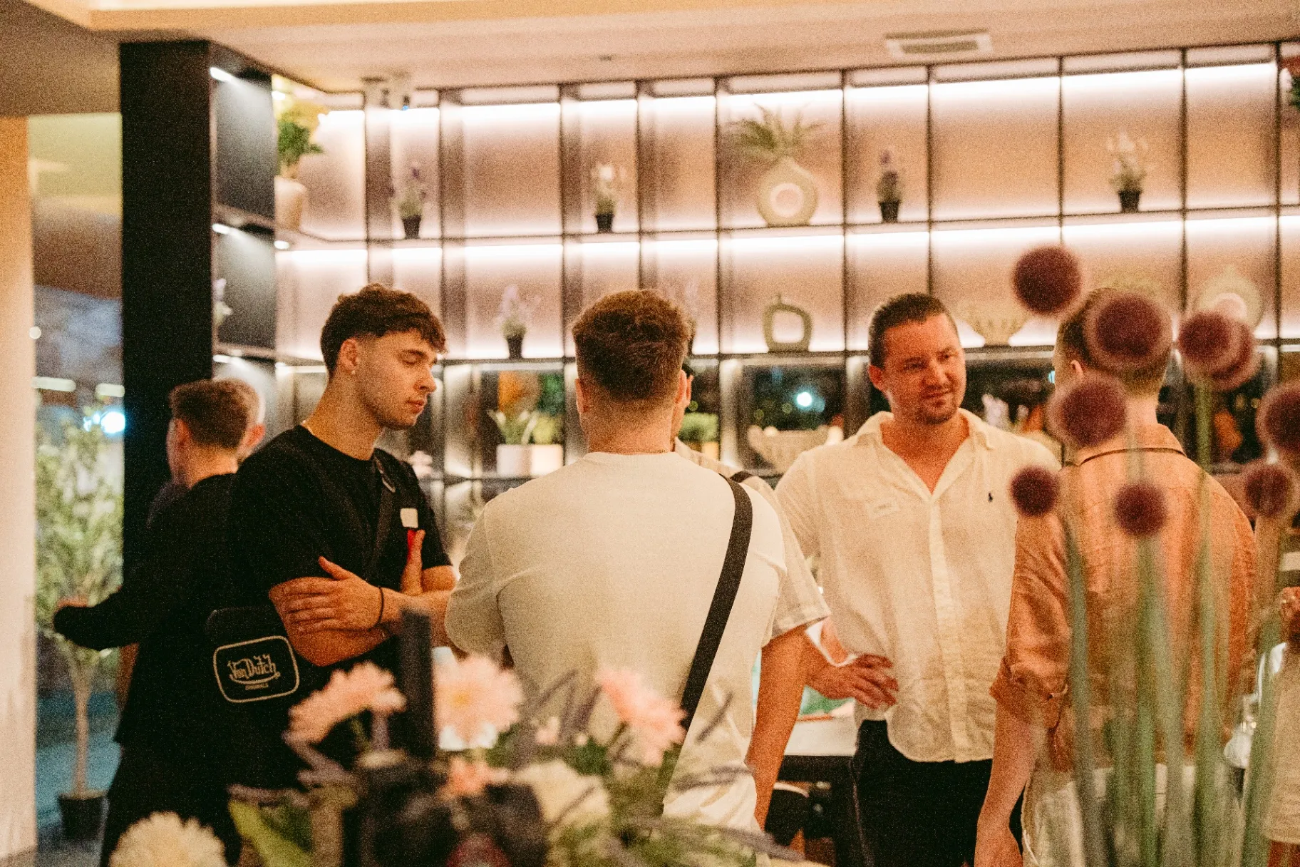 Guests conversing at private gathering