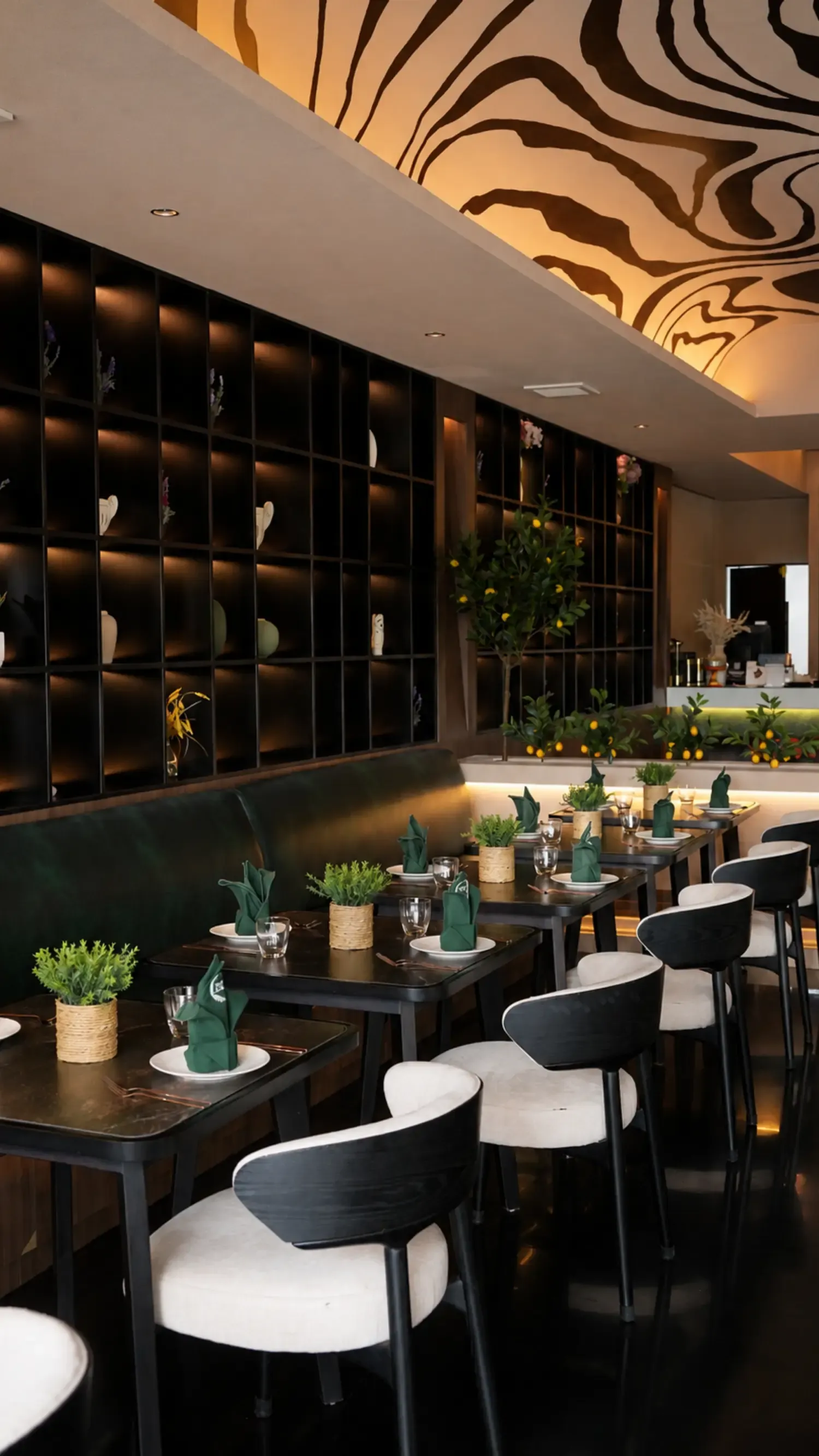 Set dining tables in the main room at Maison Almaz, Canggu