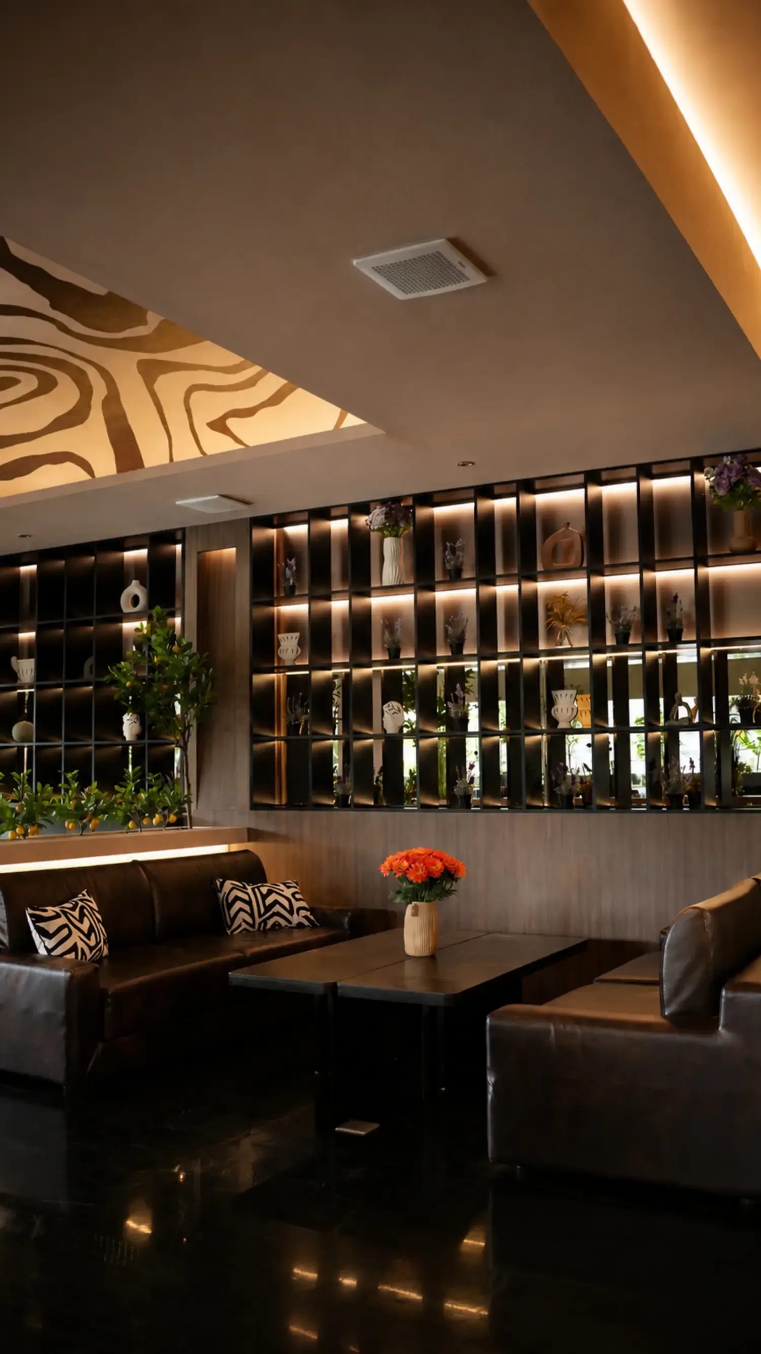 Set tables for a large group in the dining room at Maison Almaz, Canggu