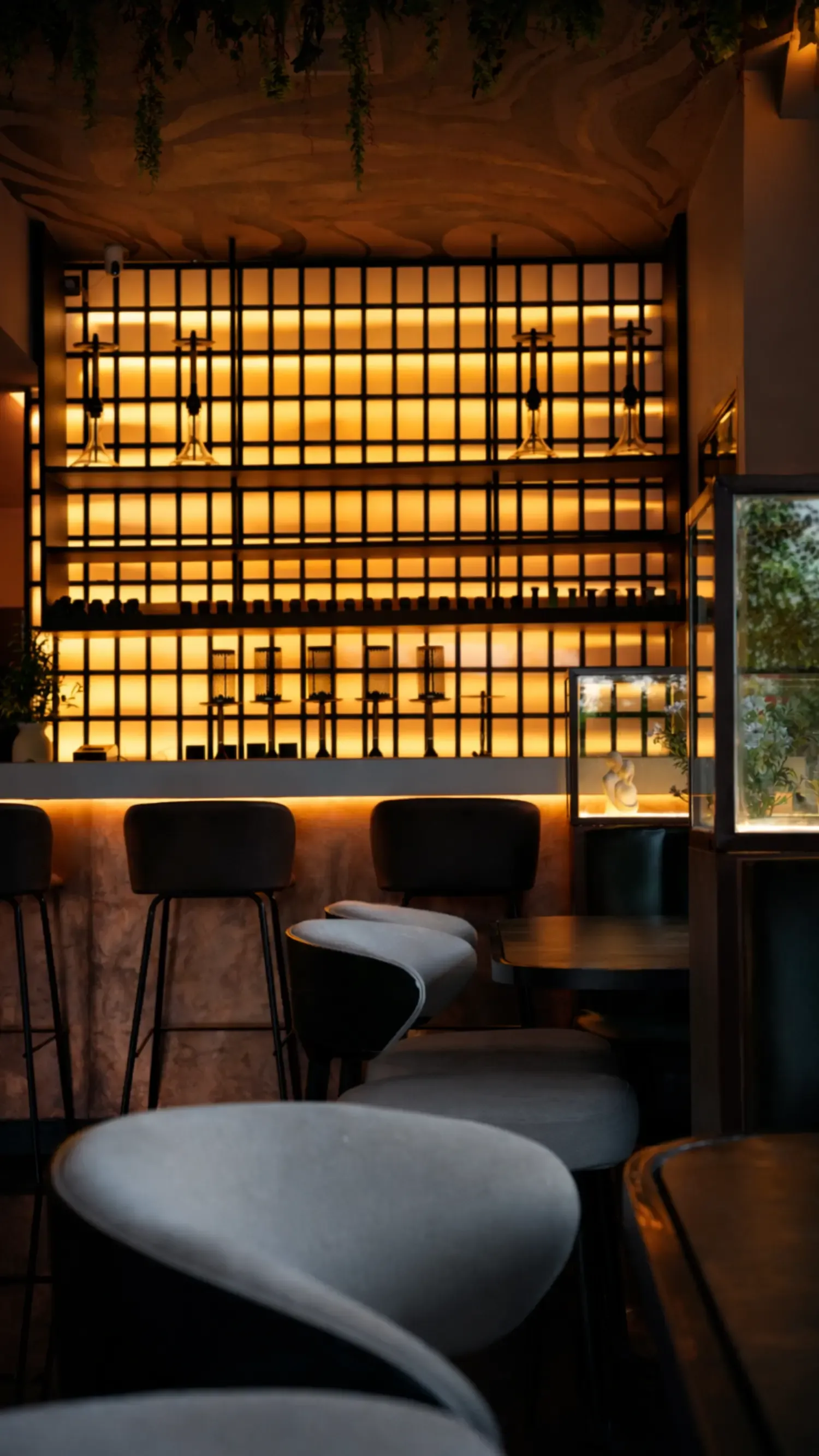 Warm backlit bar at Maison Almaz, Canggu