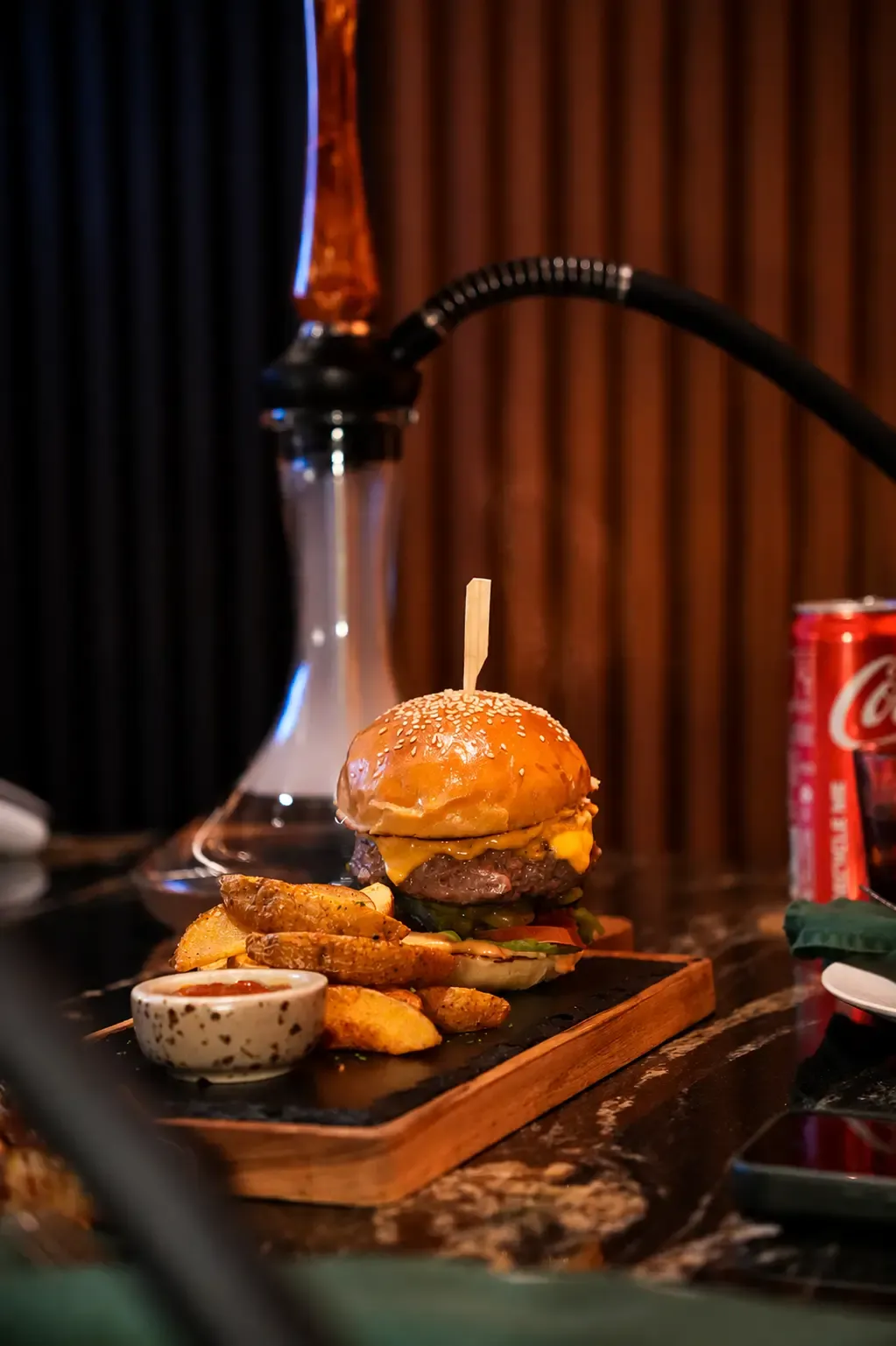 Gourmet burger and shisha served in the Private Room at Maison Almaz, Canggu