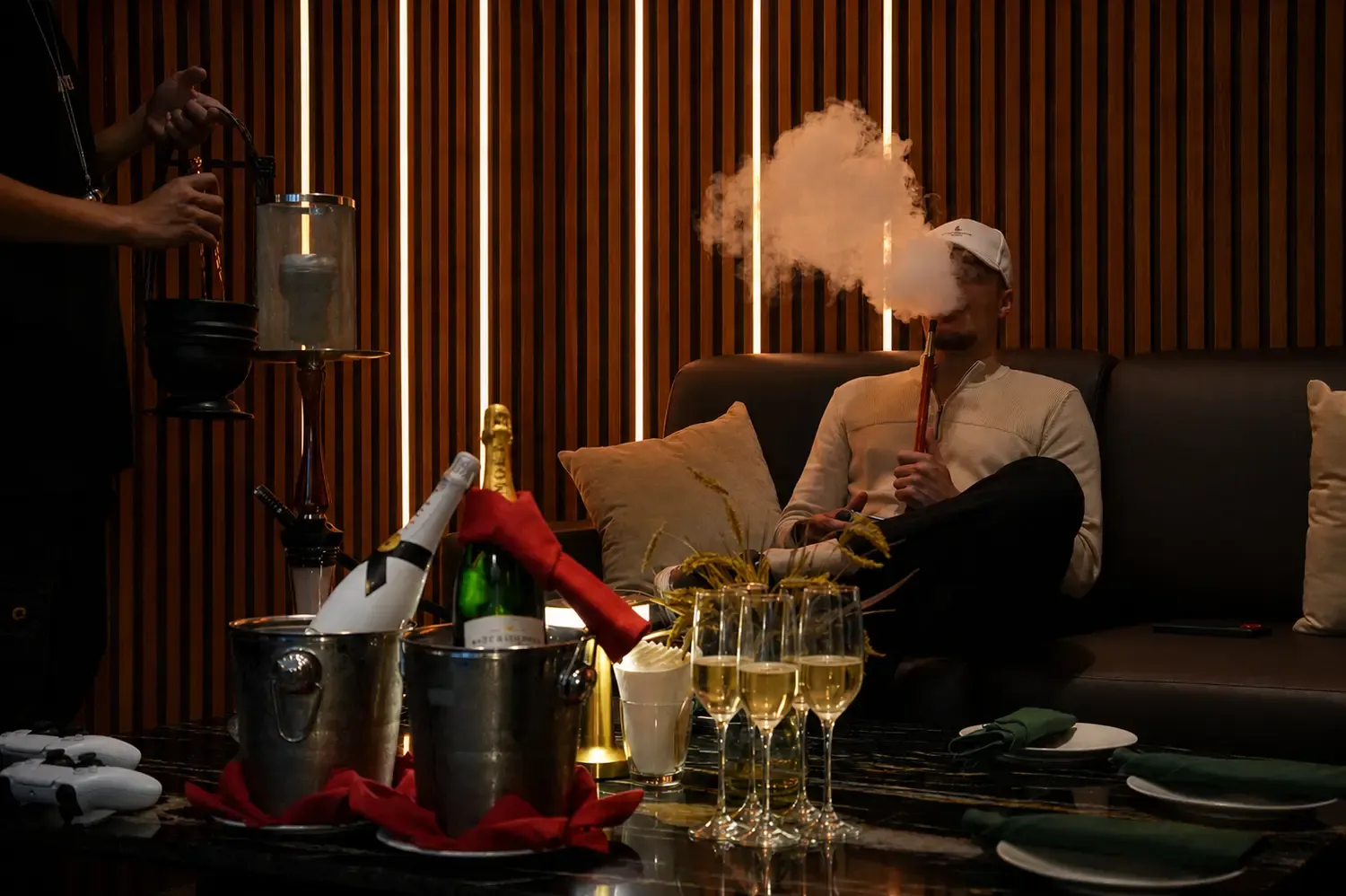 Moet champagne, glassware and a set marble table in the Private Room at Maison Almaz, Canggu