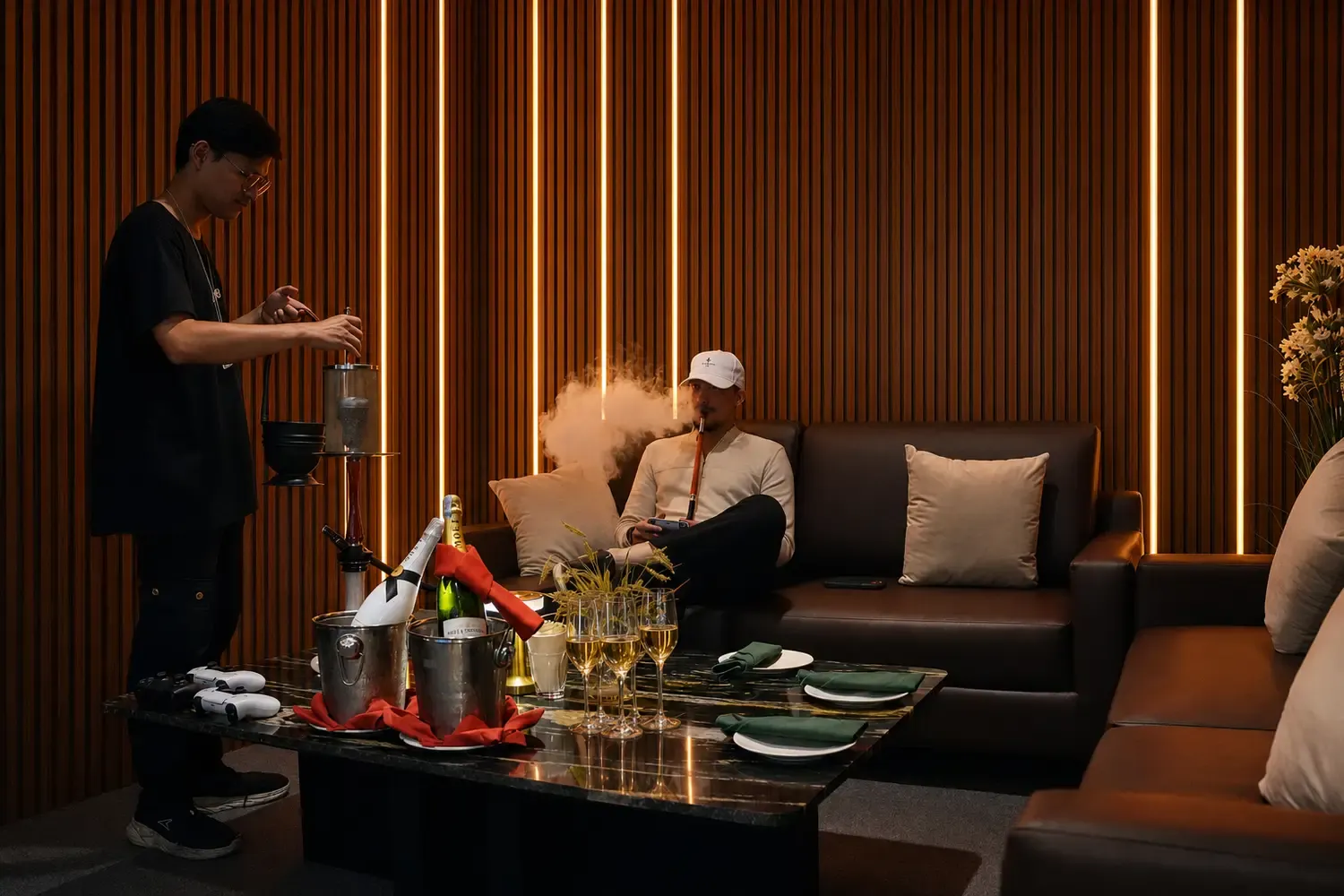 Guests relaxing with shisha in the private Private Room lounge at Maison Almaz, Canggu