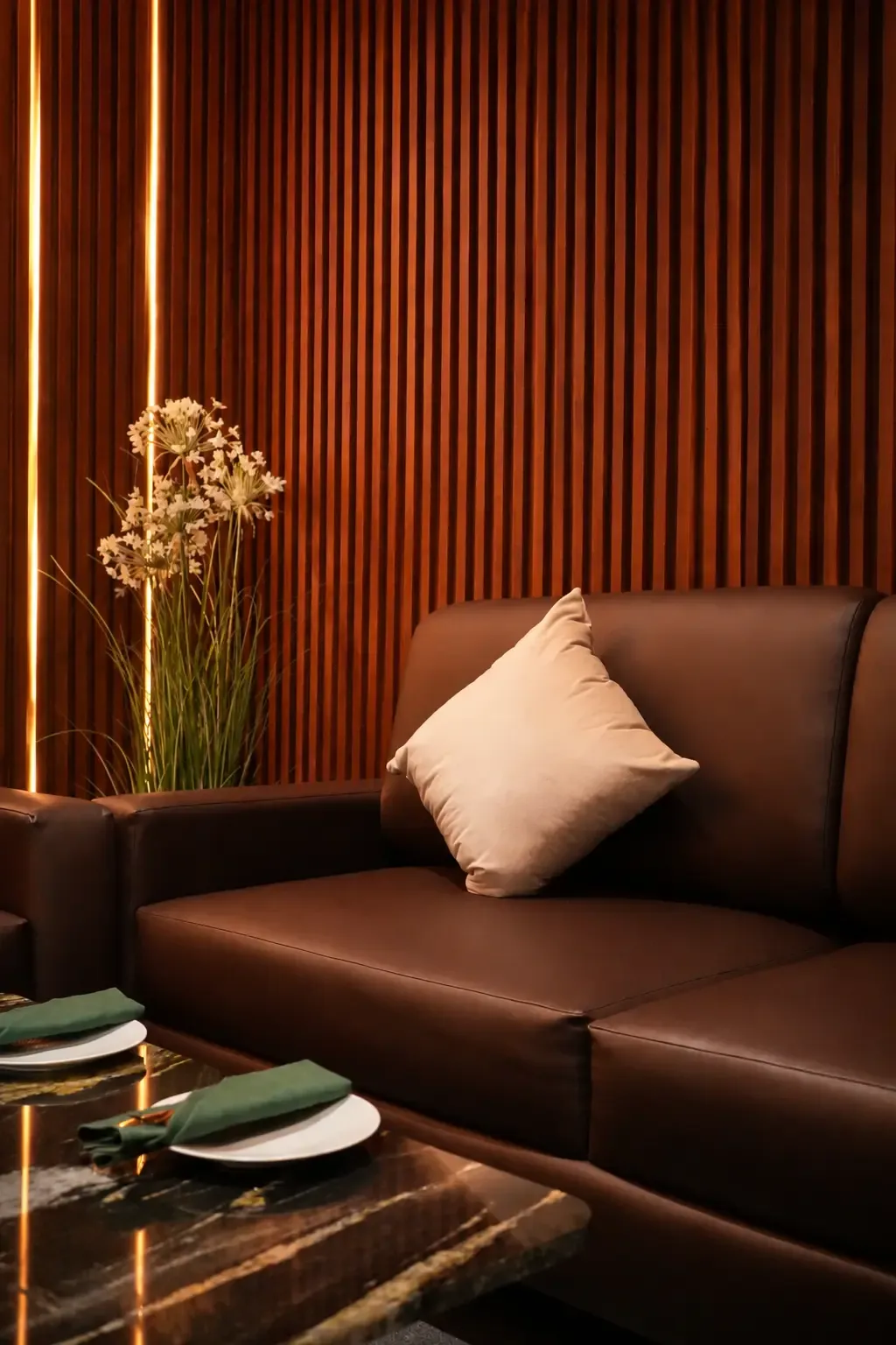Plush velvet booth seating in the private Private Room at Maison Almaz, Canggu